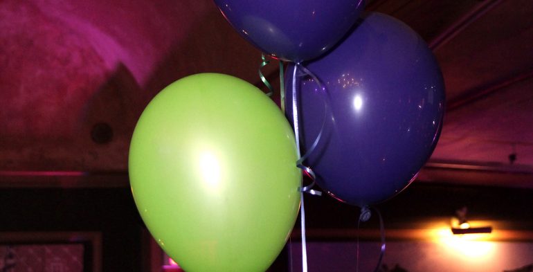 Purple and green balloons
